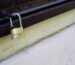A bicycle lock being lubricated